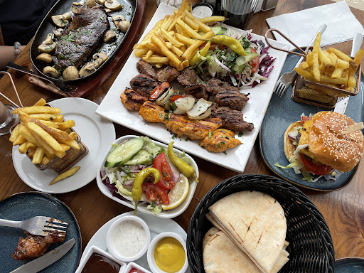 Photo of Rio Grill Epsom - 86 High St, Epsom KT19 8BA