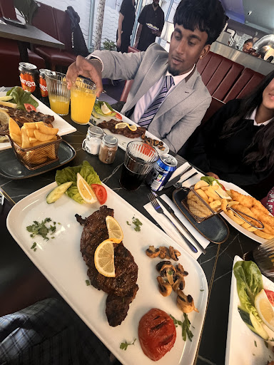 Photo of Rio Grill Epsom - 86 High St, Epsom KT19 8BA