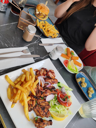 Photo of Rio Grill Epsom - 86 High St, Epsom KT19 8BA