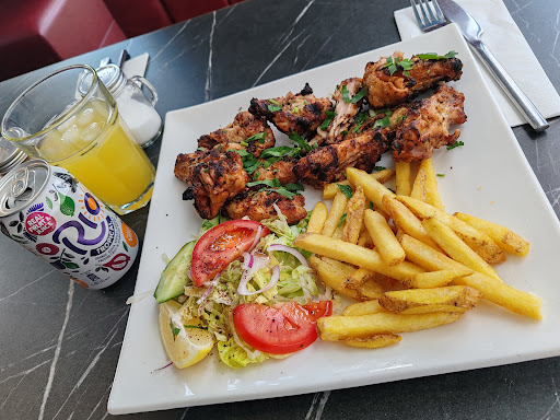 Photo of Rio Grill Epsom - 86 High St, Epsom KT19 8BA