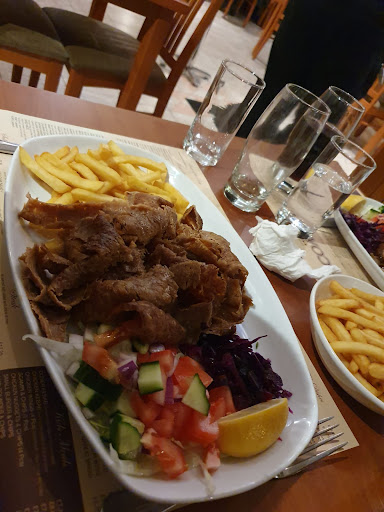 Photo of Village Charcoal Grill - 50-52 High St, Cheam, Sutton SM3 8RW