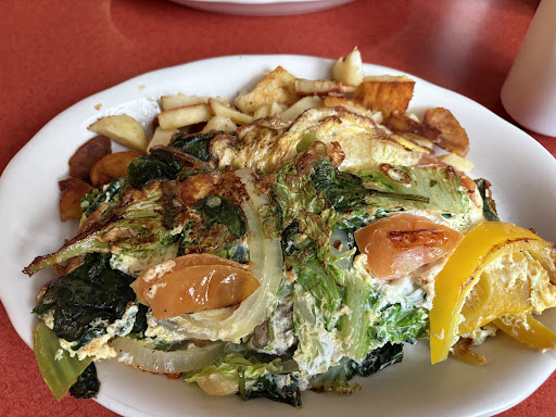 Photo of Village Charcoal Grill - 50-52 High St, Cheam, Sutton SM3 8RW