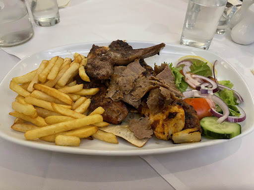 Photo of Village Charcoal Grill - 50-52 High St, Cheam, Sutton SM3 8RW