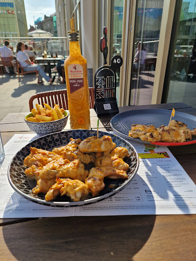 Photo of Nando's Barnsley - Unit R4, The Glass Works Shopping Centre, Barnsley S70 1GW