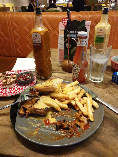 Photo of Nando's Telford - Unit 6, Southwater Square, St Quentin Gate, Telford TF3 4EJ