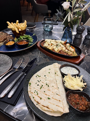 Photo of Izgara Mediterranean Grill (Leeds) - 93-95 Main St, Garforth, Leeds LS25 1AF