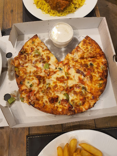 Photo of Reezek Indian Takeaway & Pizzeria - Station Road, Bellingham, Hexham NE48 2BS