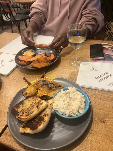 Photo of Nando's Horsham - Ye Old Kings Head Hotel, East St, Horsham RH12 1HH