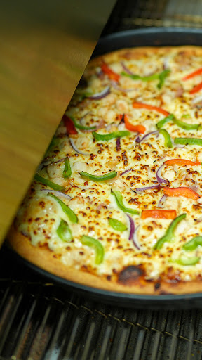 Photo of Caprinos Pizza Bedford - 44 Bunyan Rd, Kempston, Bedford MK42 8HL