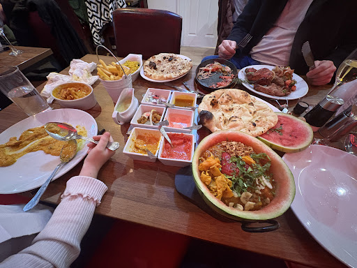 Photo of Spice Safari Restaurant & Takeaway - 6 Lancaster Square, Conwy LL32 8HT