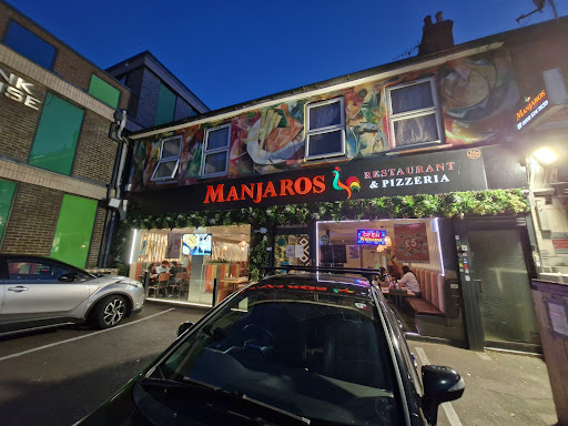 Photo of Manjaros - Restaurant in Southall - 1-3 Beaconsfield Rd, Southall UB1 1BA