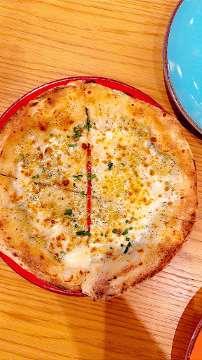 Photo of Manjaros - Restaurant in Southall - 1-3 Beaconsfield Rd, Southall UB1 1BA