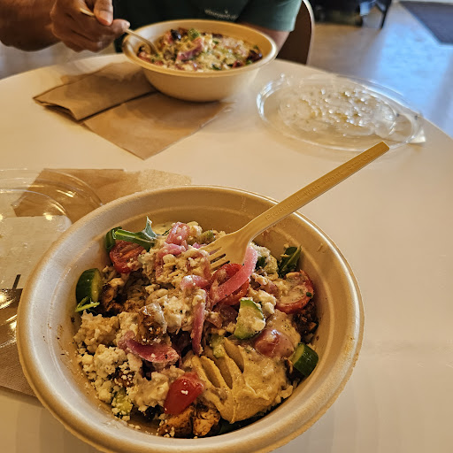 Photo of CAVA - 45 W Mitchell Hammock Rd, Oviedo, FL 32765