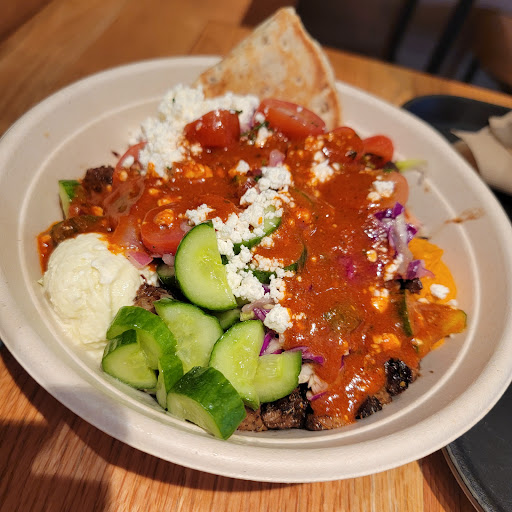 Photo of CAVA - 45 W Mitchell Hammock Rd, Oviedo, FL 32765