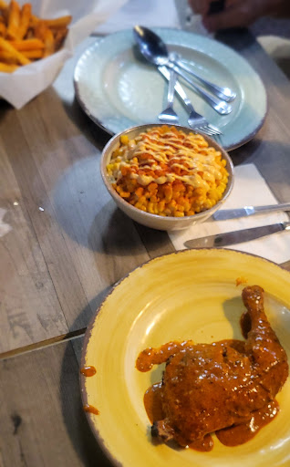 Photo of Port Of Peri Peri - 4151 McCoy Dr #153, Aurora, IL 60504