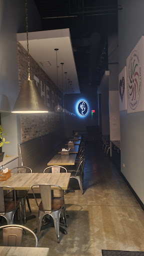 Photo of Port Of Peri Peri - 4151 McCoy Dr #153, Aurora, IL 60504