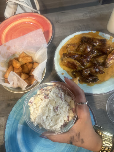 Photo of Port Of Peri Peri - 4151 McCoy Dr #153, Aurora, IL 60504