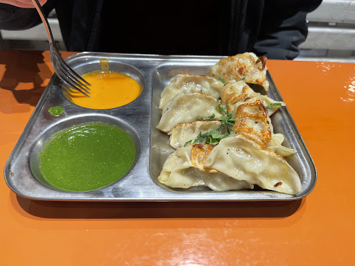 Photo of Momo's Master - 110 N Columbia St, Chapel Hill, NC 27514