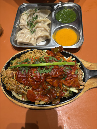 Photo of Momo's Master - 110 N Columbia St, Chapel Hill, NC 27514