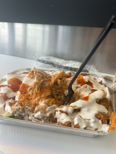 Photo of Halaleez NY Chicken & Gyro Rice Bowls - 400 S Financial Pl, Chicago, IL 60605