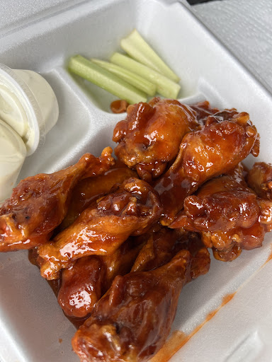 Photo of Chex Grill & Wings - 440 E McCullough Dr #120, Charlotte, NC 28262