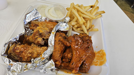 Photo of Chex Grill & Wings - 440 E McCullough Dr #120, Charlotte, NC 28262