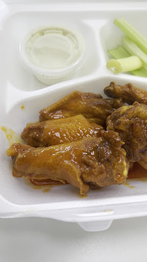 Photo of Chex Grill & Wings - 440 E McCullough Dr #120, Charlotte, NC 28262