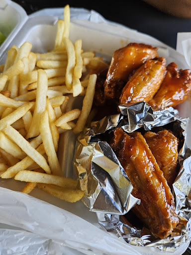 Photo of Chex Grill & Wings - 440 E McCullough Dr #120, Charlotte, NC 28262