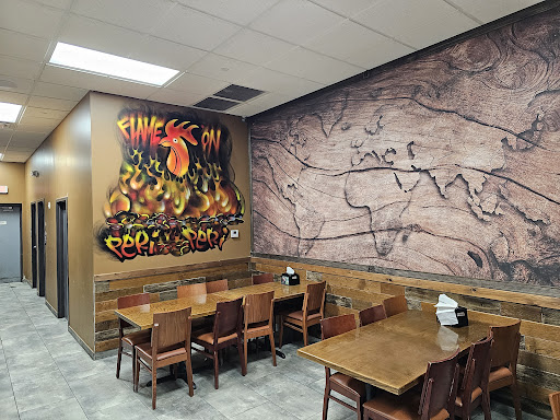 Photo of Flame on Peri Peri Grill - 7041 N Milwaukee Ave, Niles, IL 60714