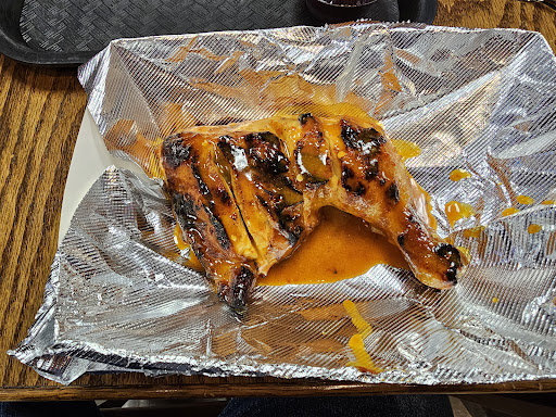 Photo of Flame on Peri Peri Grill - 7041 N Milwaukee Ave, Niles, IL 60714