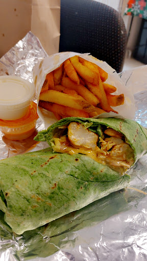 Photo of Flame on Peri Peri Grill - 7041 N Milwaukee Ave, Niles, IL 60714