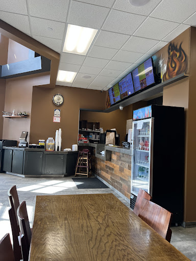 Photo of Flame on Peri Peri Grill - 7041 N Milwaukee Ave, Niles, IL 60714