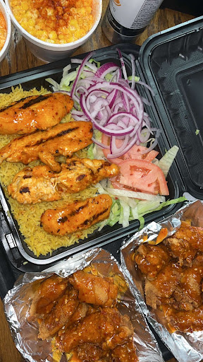 Photo of Flame on Peri Peri Grill - 7041 N Milwaukee Ave, Niles, IL 60714