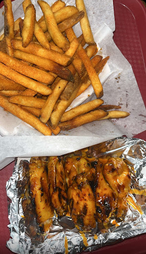 Photo of Flame on Peri Peri Grill - 7041 N Milwaukee Ave, Niles, IL 60714