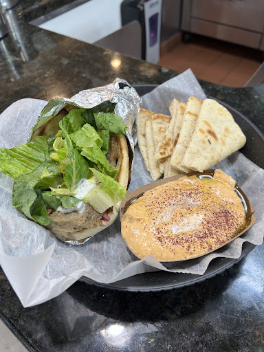 Photo of Jasmin & Olivz Mediterranean - Walnut - 1109 Ledsome Ln, Cary, NC 27511