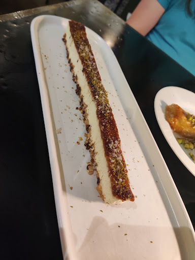 Photo of Nikos - BrightLeaf Square, 905 W Main St Unit 21B, Durham, NC 27701