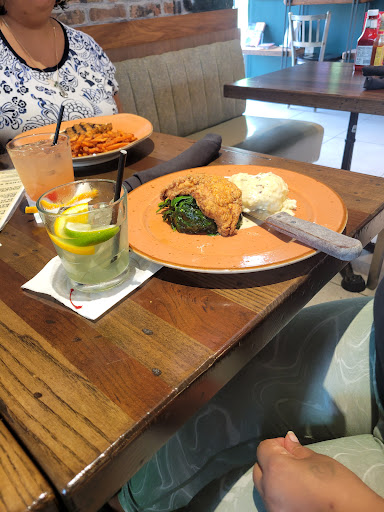 Photo of Busboys and Poets - Columbia - 6251 Mango Tree Rd, Columbia, MD 21044