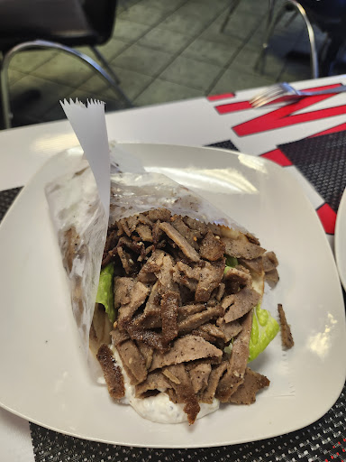 Photo of Opa Greek Restaurant - 336 9th St N, Naples, FL 34102