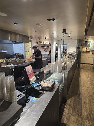 Photo of CAVA - Kamp Washington Center, 11046 Main St, Fairfax, VA 22030