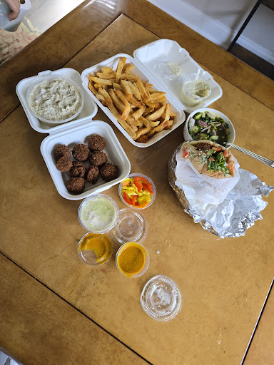 Photo of The Hummus Guy Food Truck - 711 N Orlando Ave space #1, Maitland, FL 32751
