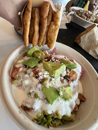 Photo of CAVA - 1156 Woodruff Rd, Greenville, SC 29607