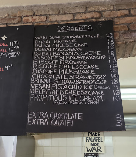 Photo of Amsterdam Falafelshop - 5835 FL-986, Miami, FL 33143