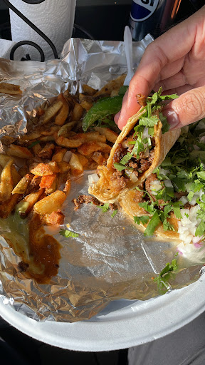 Photo of TIM TIM'S HALAL GRILL - 4148 W Montrose Ave, Chicago, IL 60641