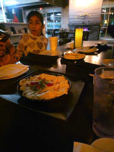 Photo of Flames Mediterranean Bar & Grill - Melbourne - 1270 N Wickham Rd, Melbourne, FL 32935