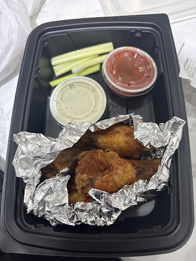 Photo of Chex Grill & Wings - 400 S Tryon St Suit R2, Charlotte, NC 28202