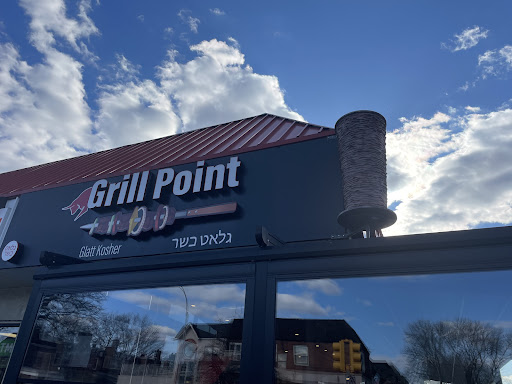 Photo of Grill Point - 69-54 Main St, Queens, NY 11367
