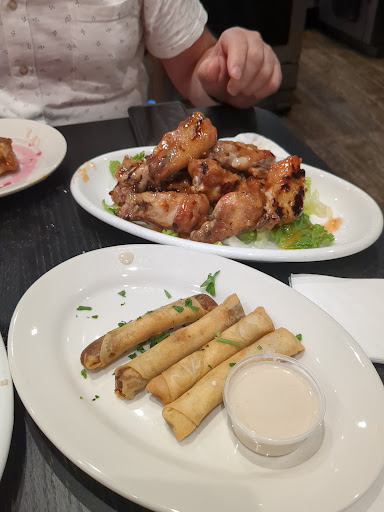 Photo of Grill Point - 69-54 Main St, Queens, NY 11367