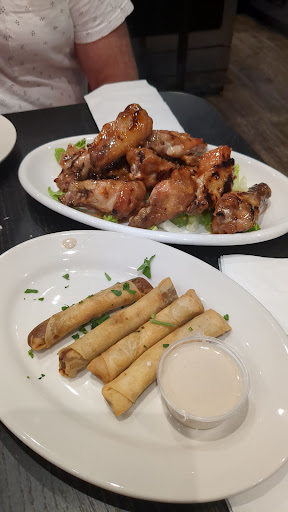 Photo of Grill Point - 69-54 Main St, Queens, NY 11367