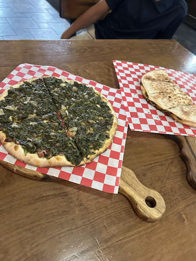 Photo of Manakeesh Cafe Bakery & Grill - 4420 Walnut St, Philadelphia, PA 19104