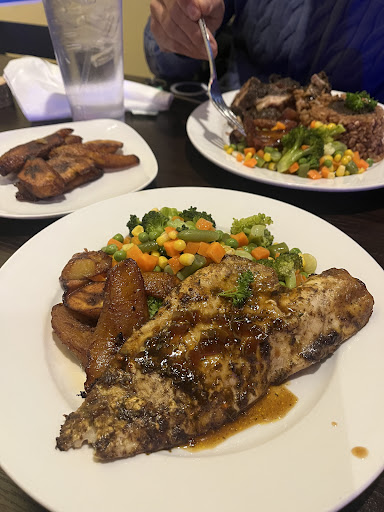 Photo of Flame Jamaican Cuisine - 44 Market St, Somersworth, NH 03878